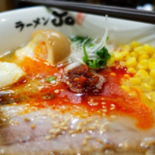 Spicy ramen with extra egg and corn